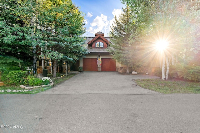 57 Mccoy Creek Dr Unit A, Edwards, CO 81632 - view of front facade with driveway and an attached garage