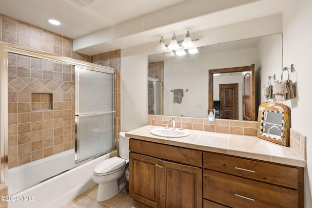 57 Mccoy Creek Dr Unit A, Edwards, CO 81632 - bathroom with vanity, shower / bath combination with glass door, and tile patterned flooring