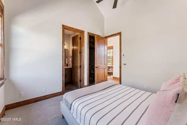 196 Spring Creek Ln, Edwards, CO 81632 - carpeted bedroom with high vaulted ceiling, a ceiling fan, and ensuite bath
