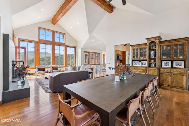 196 Spring Creek Ln, Edwards, CO 81632 - dining area featuring light wood-style flooring, high vaulted ceiling, beam ceiling, ceiling fan, and recessed lighting