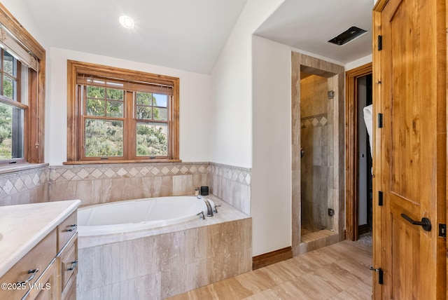 196 Spring Creek Ln, Edwards, CO 81632 - bathroom featuring a bath, a shower stall, and vanity