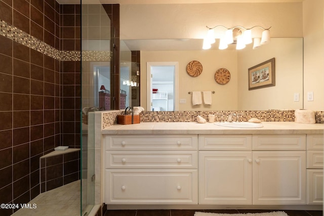 4465 Glen Falls Ln, Vail, CO 81657 - full bathroom with vanity, a stall shower, and tasteful backsplash