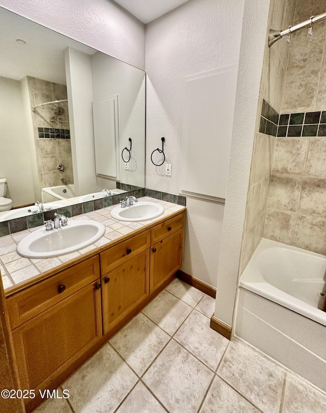 240 Chapel Pl Unit Br-309, Avon, CO 81620 - full bath with tub / shower combination, double vanity, and tile patterned floors