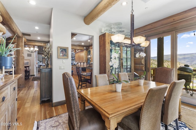 1416 Red Draw, Edwards, CO 81632 - dining space featuring a chandelier, recessed lighting, light wood finished floors, and beamed ceiling