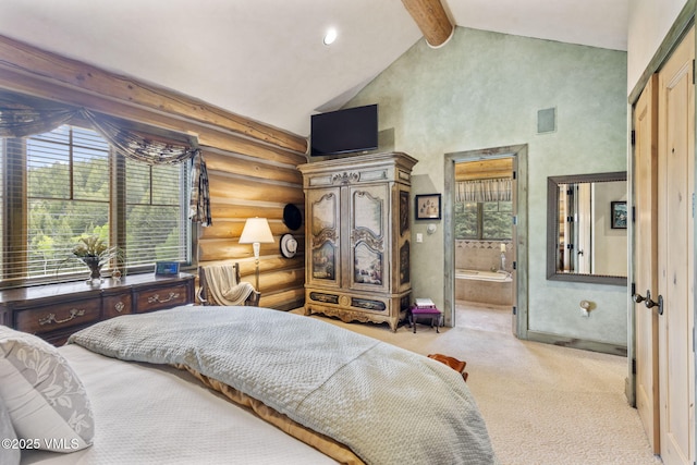 1416 Red Draw, Edwards, CO 81632 - carpeted bedroom with rustic walls, multiple windows, and ensuite bath