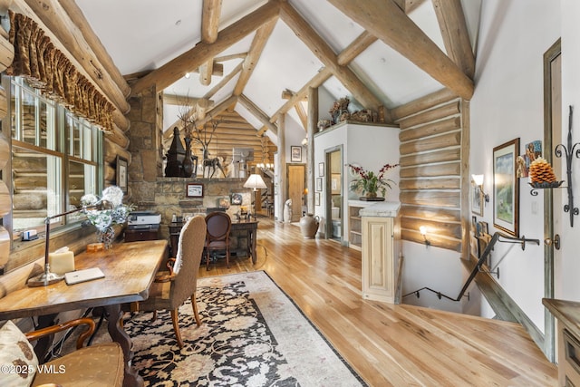 1416 Red Draw, Edwards, CO 81632 - office space with log walls, high vaulted ceiling, light wood-type flooring, and beam ceiling