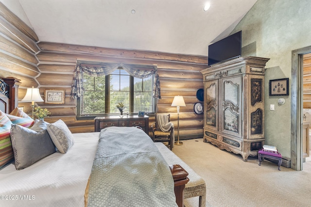 1416 Red Draw, Edwards, CO 81632 - bedroom with log walls, lofted ceiling, and carpet flooring