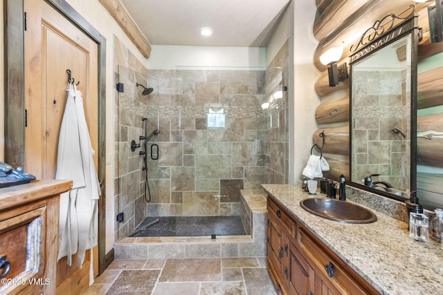 1416 Red Draw, Edwards, CO 81632 - bathroom featuring a shower stall, vanity, stone finish flooring, and recessed lighting
