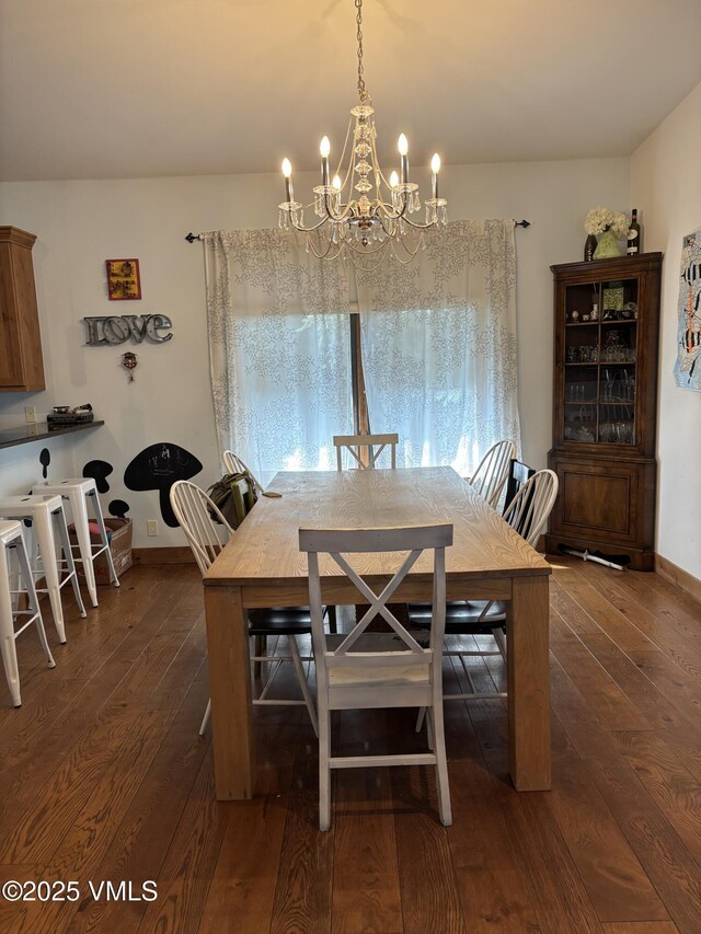 40 Bunker Way, Eagle, CO 81631 - dining space featuring dark wood-style floors and a chandelier