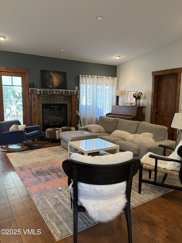 40 Bunker Way, Eagle, CO 81631 - living room with healthy amount of natural light, hardwood / wood-style floors, a tiled fireplace, and recessed lighting