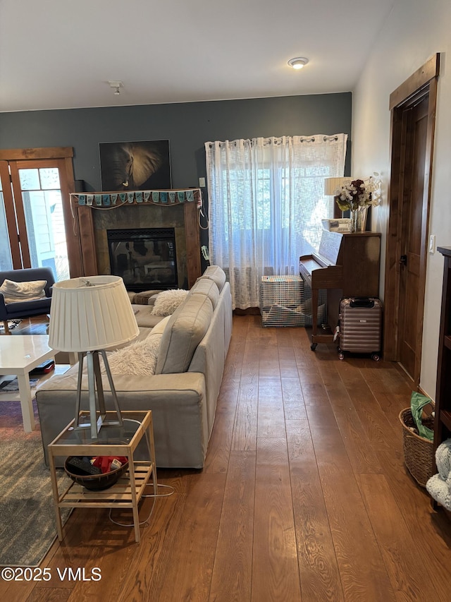 40 Bunker Way, Eagle, CO 81631 - living area featuring hardwood / wood-style flooring and a tile fireplace