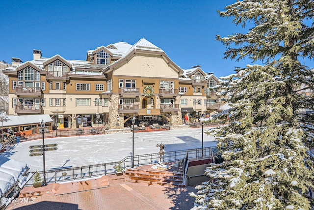 view of snow covered property