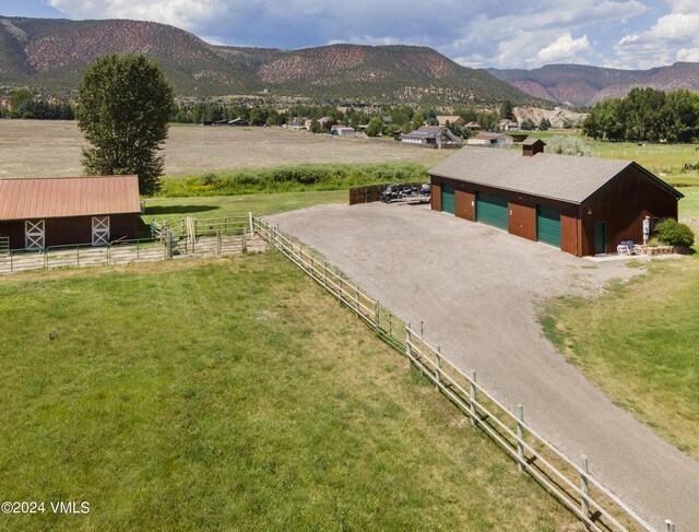 view of mountain feature with a rural view