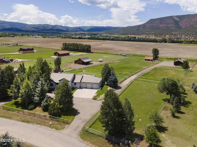 bird's eye view featuring a mountain view and a rural view