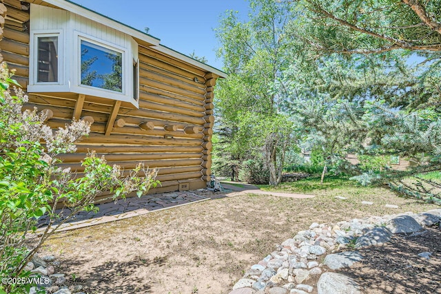 121 Hackamore Rd Unit A, Edwards, CO 81632 - view of property exterior featuring log exterior