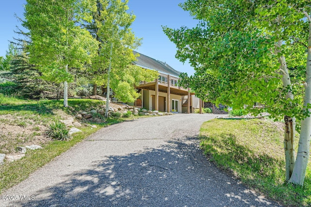 121 Hackamore Rd Unit A, Edwards, CO 81632 - view of front facade featuring driveway and a wooden deck