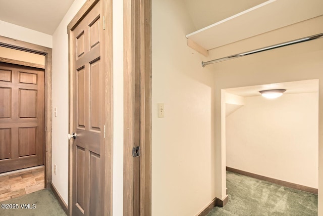 121 Hackamore Rd Unit A, Edwards, CO 81632 - hallway with light colored carpet and baseboards