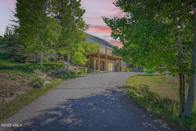 121 Hackamore Rd Unit A, Edwards, CO 81632 - view of front of home featuring driveway, a garage, stucco siding, and a deck