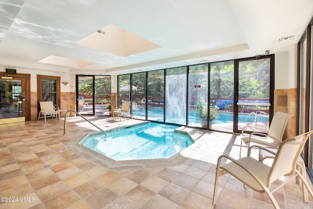 pool featuring a skylight