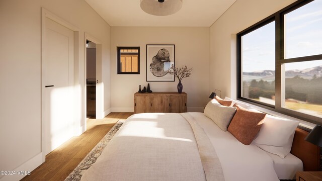 bedroom with light wood-type flooring