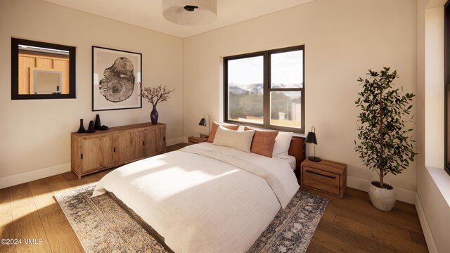 bedroom with dark wood-type flooring