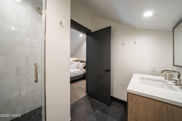 bathroom featuring recessed lighting, ensuite bathroom, vanity, a shower stall, and baseboards