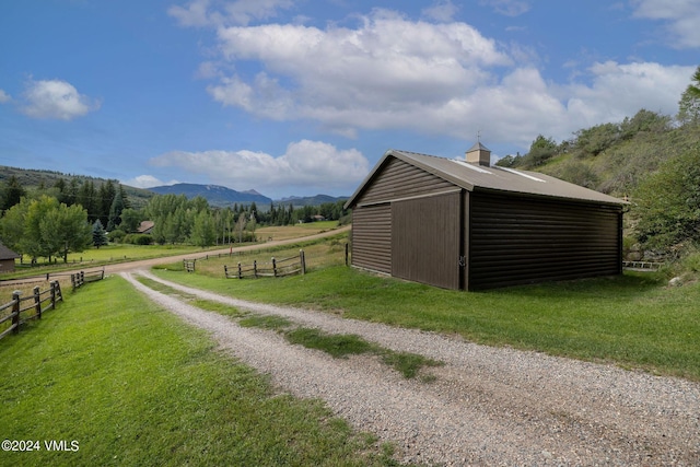 407 Meadow Rd, Edwards, CO 81632 - view of outdoor structure with a mountain view, an outbuilding, and a view of countryside