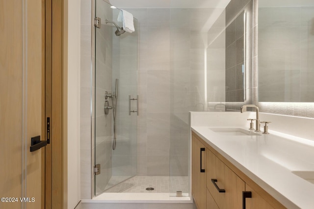 bathroom with vanity and walk in shower