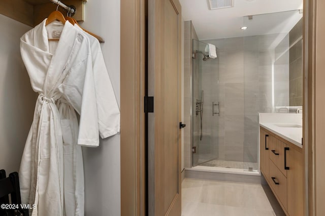 bathroom with vanity and walk in shower