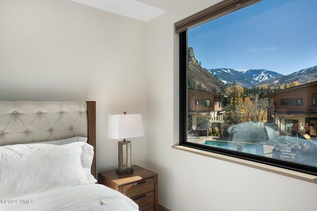 bedroom with a mountain view