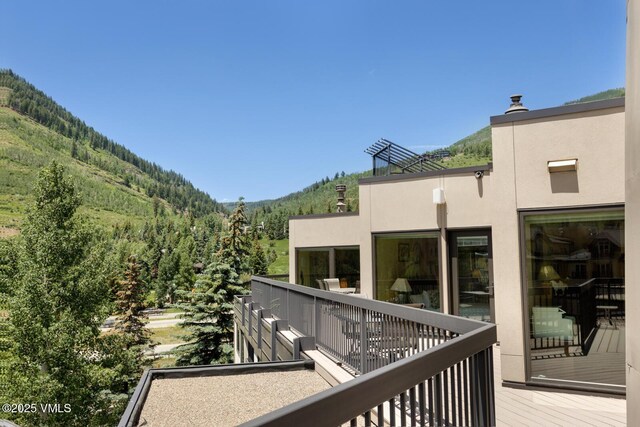 710 W Lionshead Cir Unit 501, Vail, CO 81657 - balcony with a mountain view and a wooded view