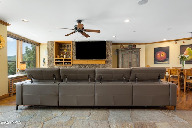 710 W Lionshead Cir Unit 501, Vail, CO 81657 - living room featuring a ceiling fan, recessed lighting, crown molding, and stone finish floors