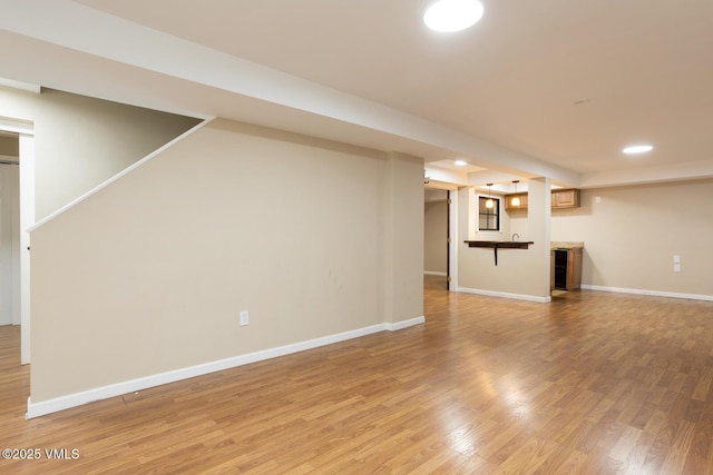 260 Longview Ave, Eagle, CO 81631 - unfurnished living room featuring baseboards, light wood-style floors, and recessed lighting