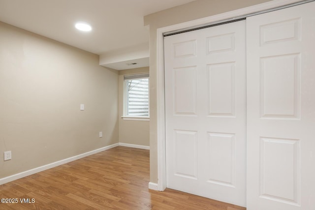 260 Longview Ave, Eagle, CO 81631 - unfurnished bedroom with baseboards, a closet, and light wood-style flooring