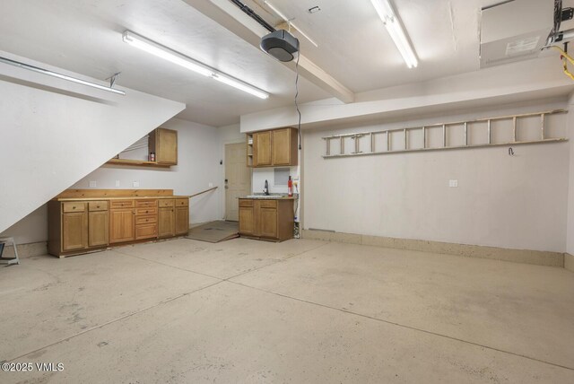 260 Longview Ave, Eagle, CO 81631 - garage featuring a garage door opener and a sink