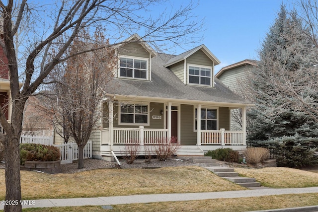 260 Longview Ave, Eagle, CO 81631 - new england style home with covered porch, fence, and roof with shingles