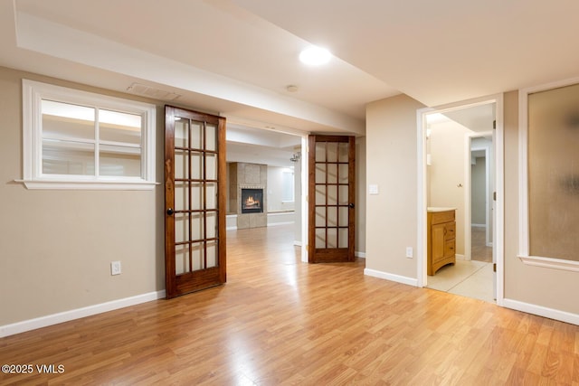 260 Longview Ave, Eagle, CO 81631 - empty room featuring light wood finished floors, baseboards, and a tiled fireplace