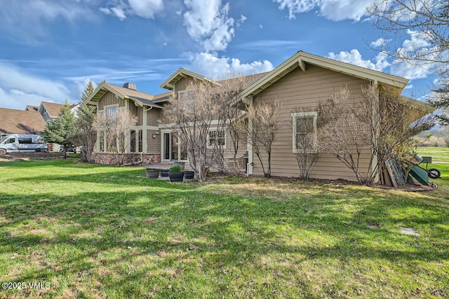 1987 Eagle Ranch Rd, Eagle, CO 81631 - rear view of property with a yard and board and batten siding