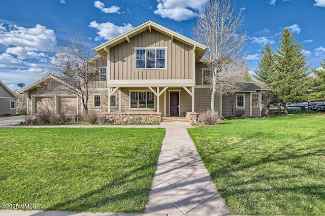 1987 Eagle Ranch Rd, Eagle, CO 81631 - view of front of house featuring board and batten siding, a garage, a porch, and a front yard