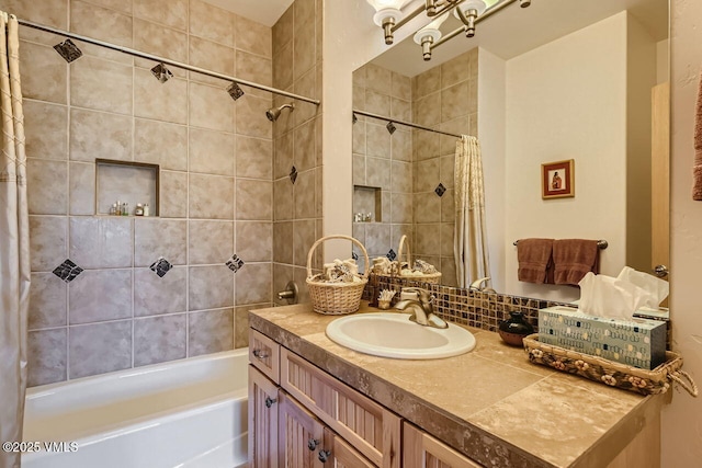 1987 Eagle Ranch Rd, Eagle, CO 81631 - bathroom featuring shower / bath combo with shower curtain, vanity, and tasteful backsplash