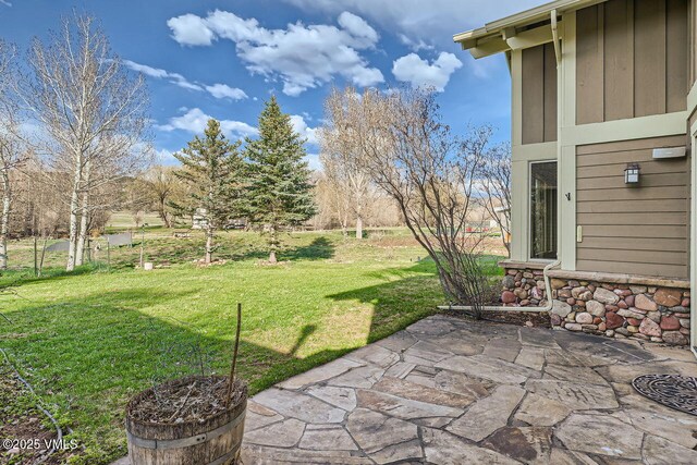 1987 Eagle Ranch Rd, Eagle, CO 81631 - view of grassy yard featuring a patio