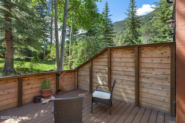 4506 Spruce Way Unit 2, Vail, CO 81657 - wooden deck with a mountain view