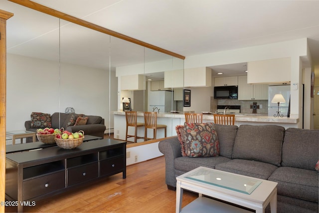 4506 Spruce Way Unit 2, Vail, CO 81657 - living area featuring light wood finished floors