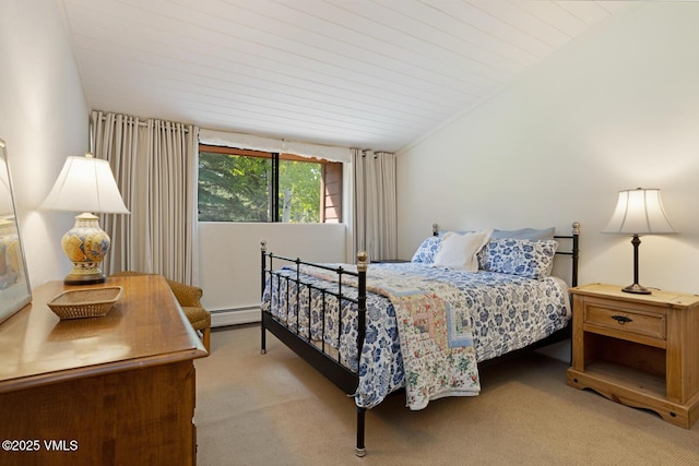 4506 Spruce Way Unit 2, Vail, CO 81657 - bedroom featuring a baseboard heating unit, carpet flooring, and lofted ceiling