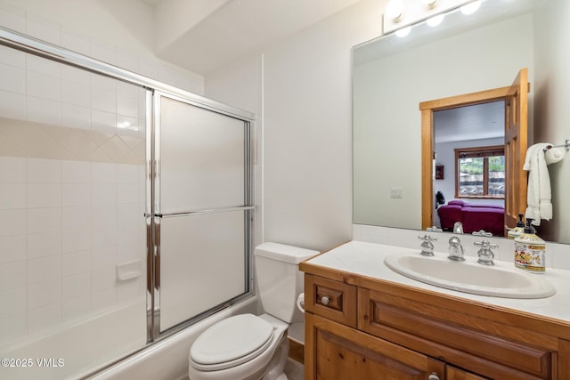 25 Cottage Cir, Edwards, CO 81632 - ensuite bathroom with toilet, vanity, and shower / bath combination with glass door