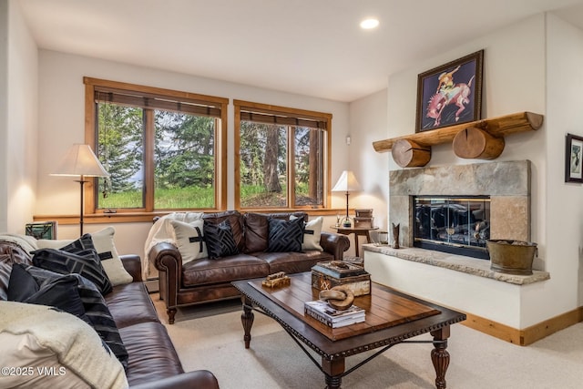 25 Cottage Cir, Edwards, CO 81632 - living room featuring light carpet, plenty of natural light, a glass covered fireplace, baseboard heating, and recessed lighting