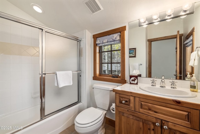 25 Cottage Cir, Edwards, CO 81632 - bathroom with toilet, vanity, and enclosed tub / shower combo