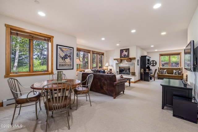 25 Cottage Cir, Edwards, CO 81632 - dining room featuring light carpet, recessed lighting, a glass covered fireplace, a baseboard heating unit, and baseboards