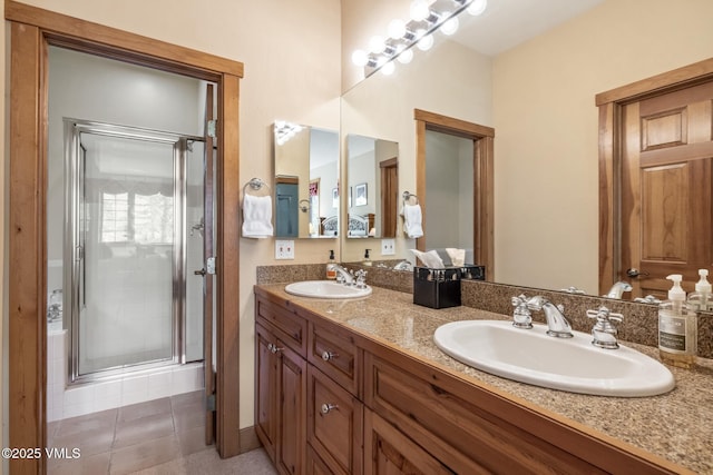 25 Cottage Cir, Edwards, CO 81632 - full bath with double vanity, a shower stall, and tile patterned flooring