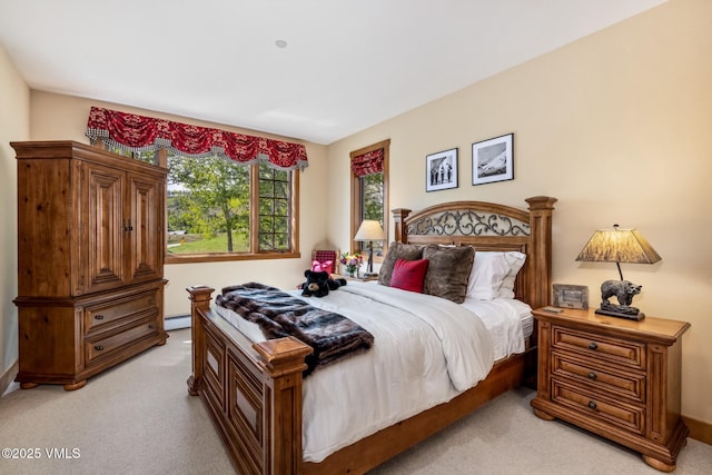 25 Cottage Cir, Edwards, CO 81632 - bedroom with light colored carpet and a baseboard radiator